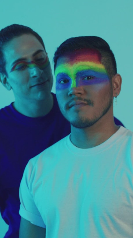 Portrait of LGBT couple of men embracing