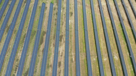 Power generation field with solar panels.