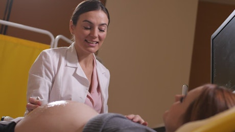 Pregnant patient at an ultrasound session.