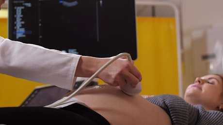 Pregnant woman at an ultrasound session.