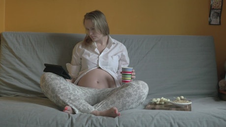 Pregnant woman at home