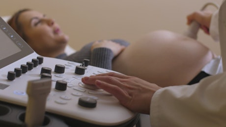 Pregnant woman having an Ultrasound.