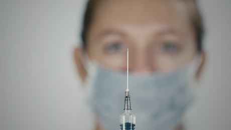 Preparing a vaccine syringe