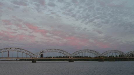 Railway bridge in a pink sunset