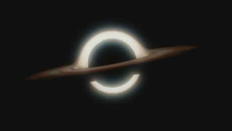 Rendering of a Black Hole rotating in the darkness of space.
