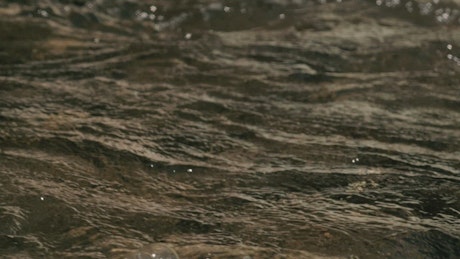 River with water flowing in slow motion