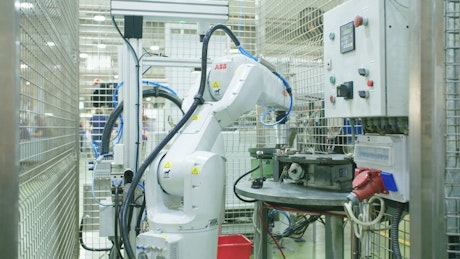 Robot working in a production line.