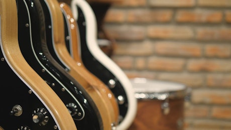 Row of guitars.