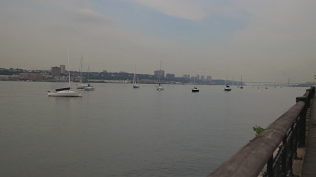 Sailboats anchored in the Hudson.
