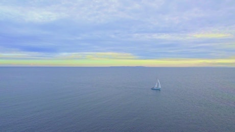 Sailing boat crossing the ocean.
