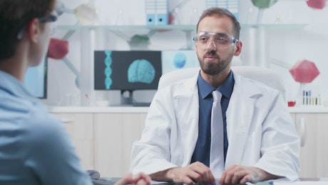 Scientist uses innovative AR tech while talking to colleague