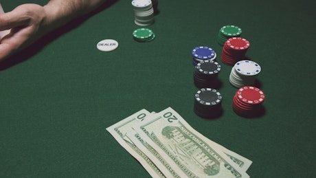 Shuffling cards at the Poker table