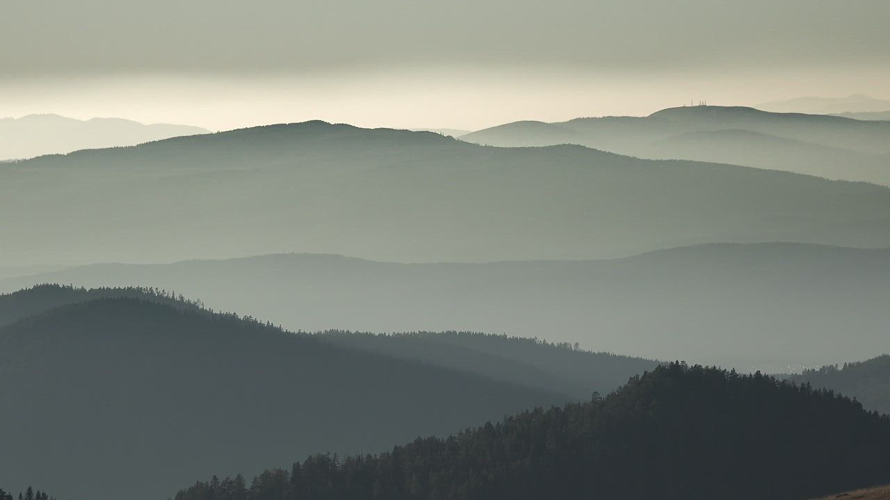 Silhouette of hills and mountains in the distance - Free Stock Video
