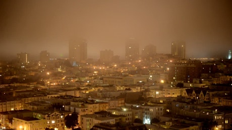 Skyline of San Francisco on a foggy night.