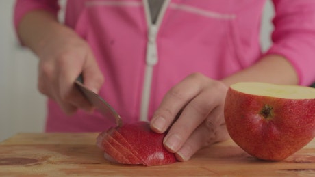 Slicing an apple.