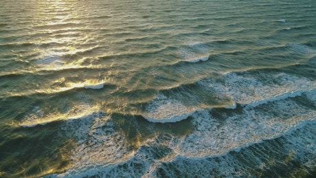 Small waves reaching the beach