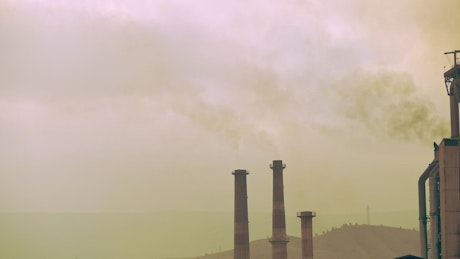 Smoking chimneys of factories.