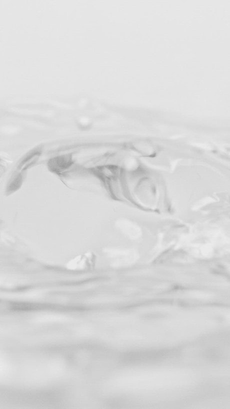 Smooth bubbling water in black and white.