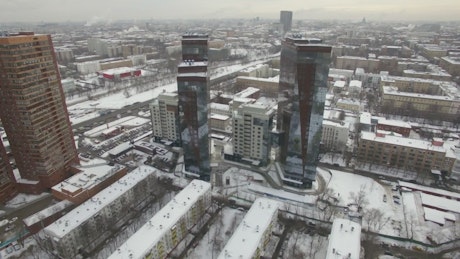 Snow covered buildings in an urban city