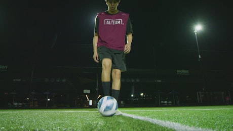 Soccer player juggling the ball with great skill