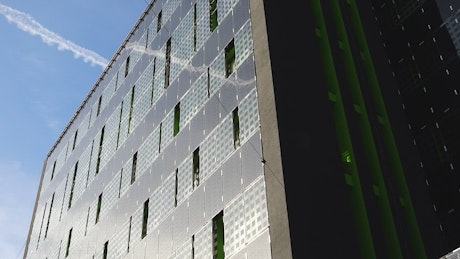 Solar panels on the side of a building.
