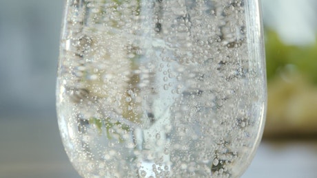 Sparkling mineral water on the glass