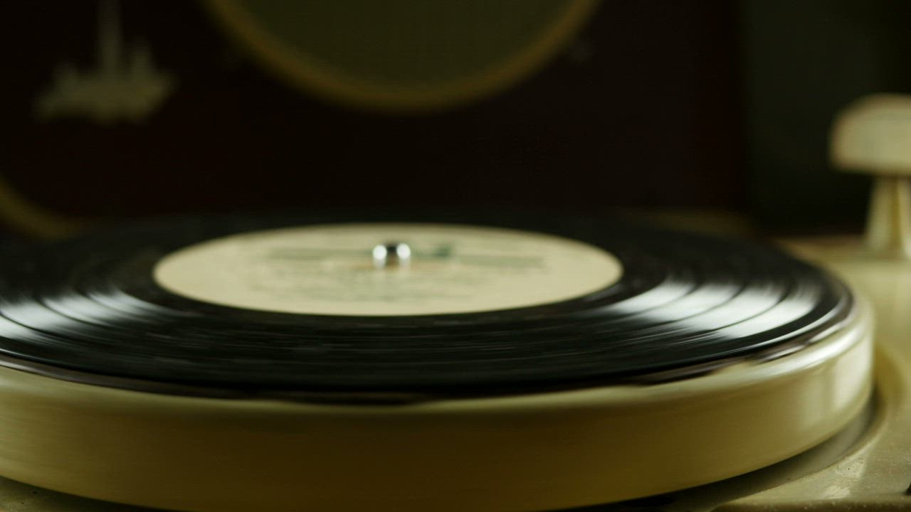 Spinning vinyl on a vintage turntable - Free Stock Video