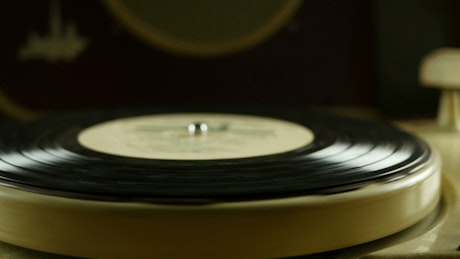 Spinning vinyl on a vintage turntable.