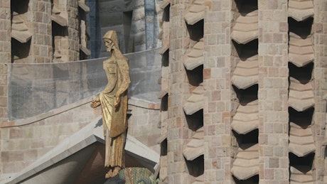 Statue of Christ located on the facade of the Temple