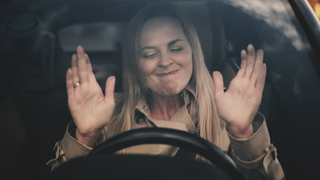 Stressed woman inside her car.