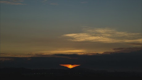 Sunrise between two hills