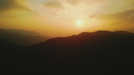 Sunset over mountain ranges.