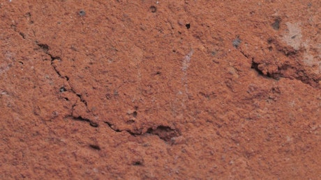 Surface texture of a red rock.