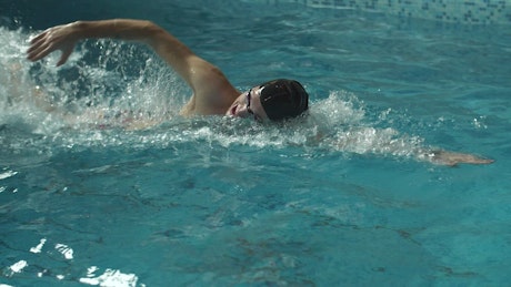 Swimmer practicing in the pool.
