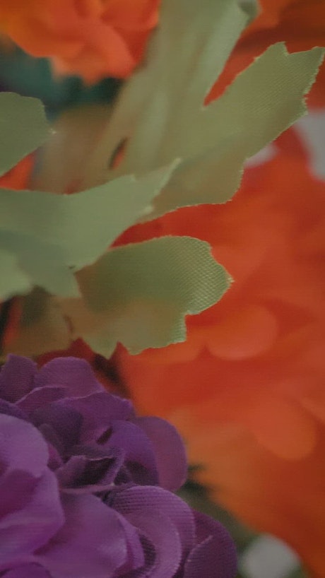 Synthetic fabric flowers, close view.