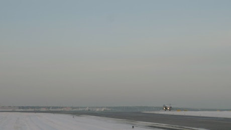 Taking off from a snowy airfield