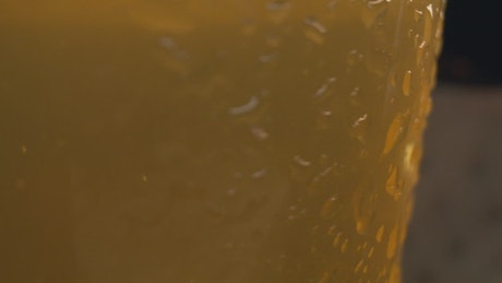 Texture of a glass with cold beer.
