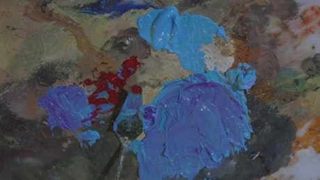 Texture of an artist's palette with paint.