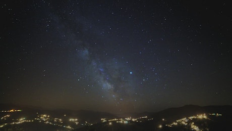 The milky way over the city lights