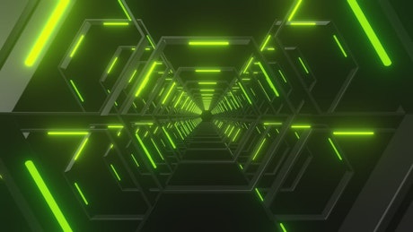 Through a tunnel made of hexagons of green light.