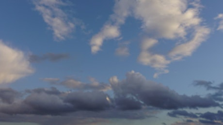 Time-lapse of blue sky with clouds.
