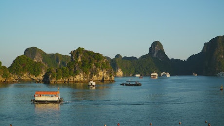 Time lapse of boats travelling through Ha Long Bay in Vietnam.