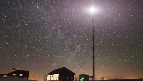 Time-lapse of the moving stars and a tower.