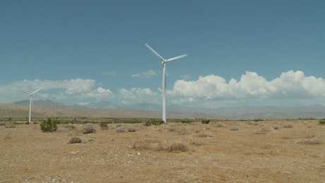 Time lapse of wind powered turbines.