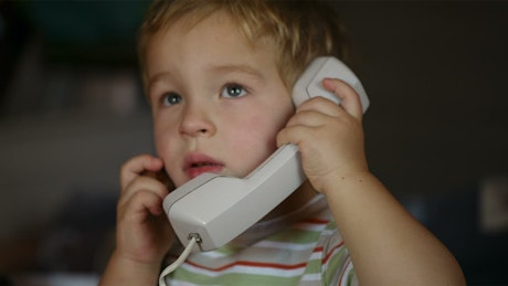 Toddler talking on the phone