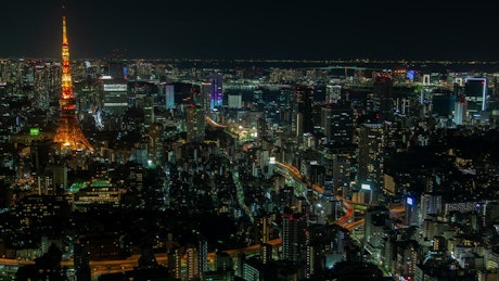 Tokyo cityscape at night with illuminated tower