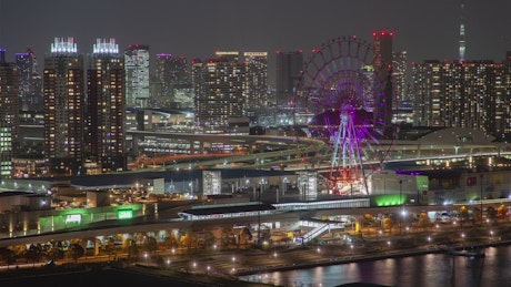 Tokyo iluminated cityscape and fast traffic.