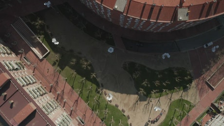 Top aerial shot crossing Barcelona buildings