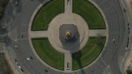 Top shot of a statue roundabout in the city.