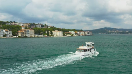 Tour boat heading through Istanbul.